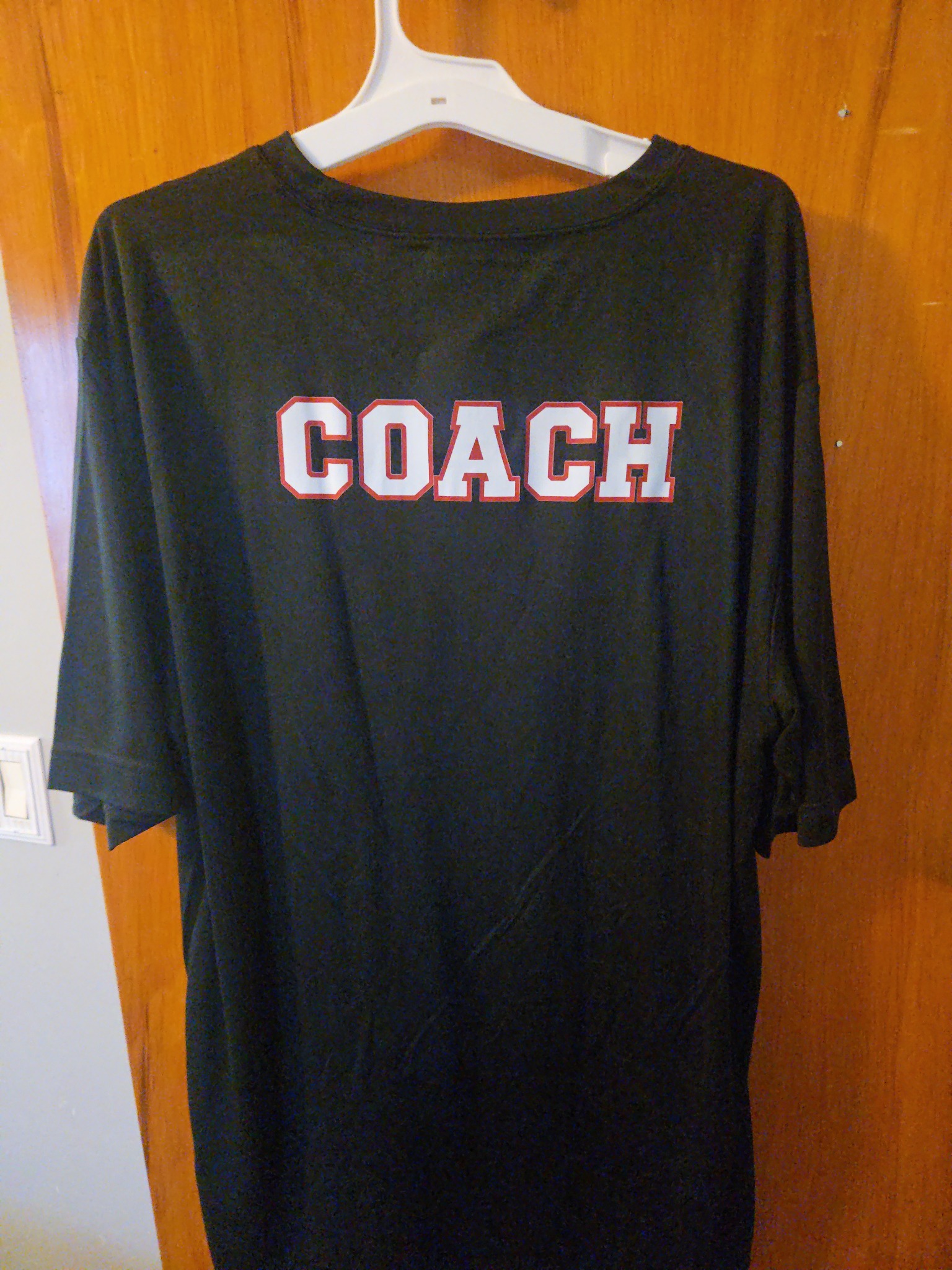 Black COACH shirt, back
